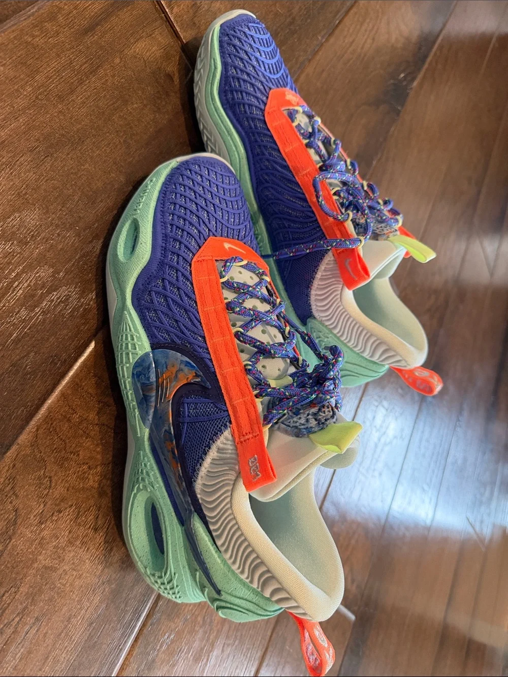 Nike Kids Blue Sneakers with Orange and Mint Accents